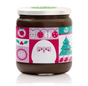 vasetto di crema fondente vegan con etichetta natalizia con vari riquadri verde natale, rosa, bordeaux e bianco che riprendono elementi tipici del natale e al centro babbo natale che sorride
